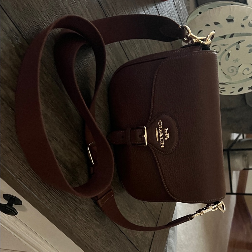 Amelia Coach saddle bag used only a couple of times.. Excellent condition..